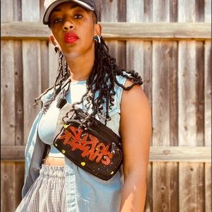 She’s a World Chnager black and gold vintage earrings